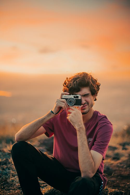 Photographing Man with Analog Camera