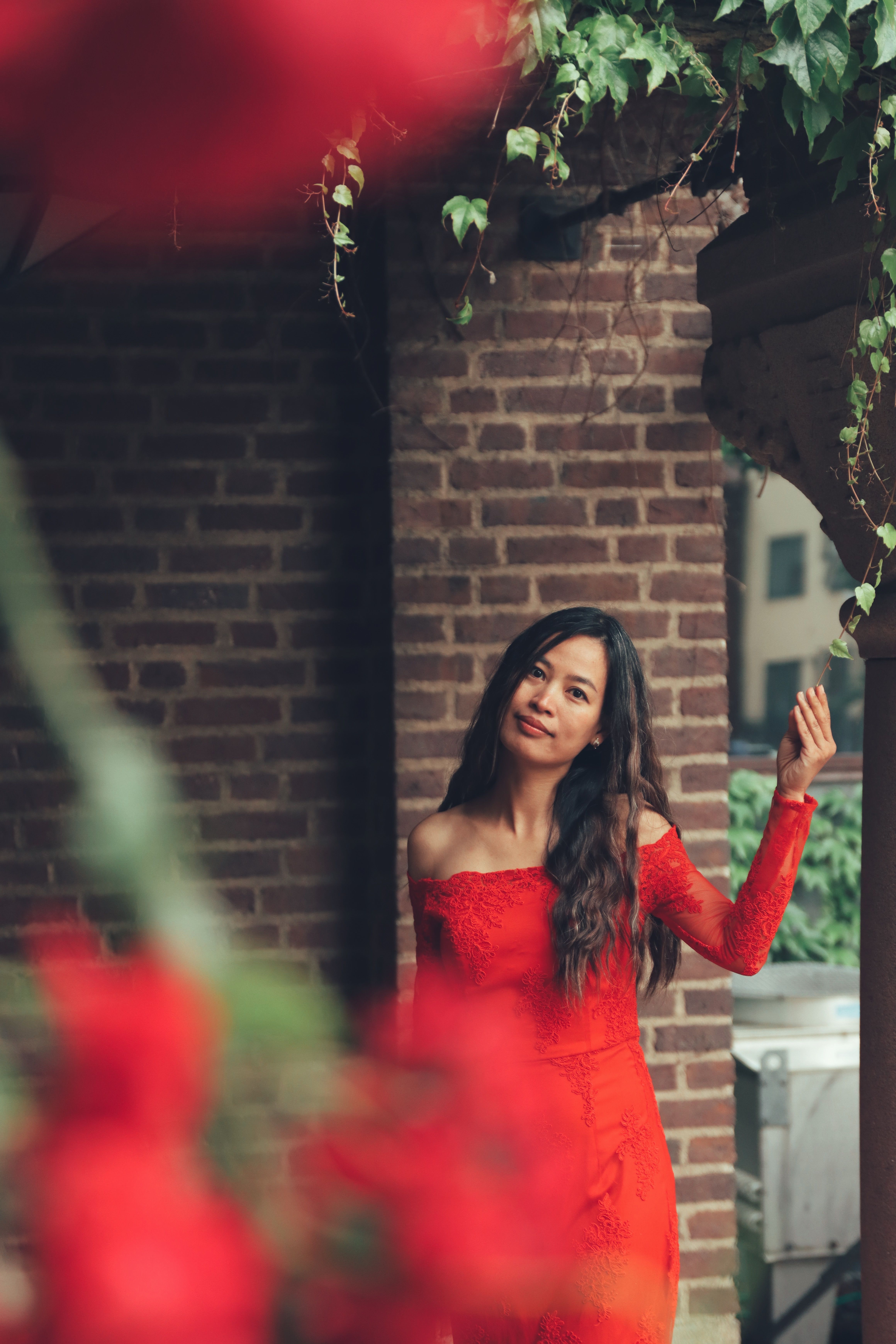 Standing Woman in Red Strapless Dress · Free Stock Photo
