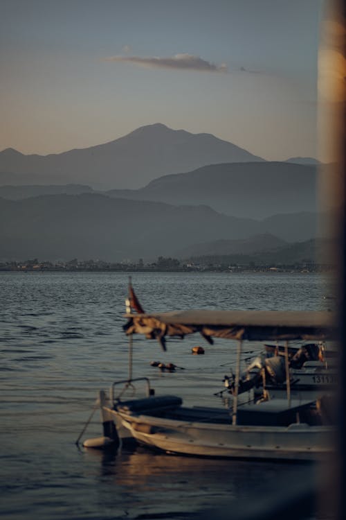 Moored Motorboat with Hills behind