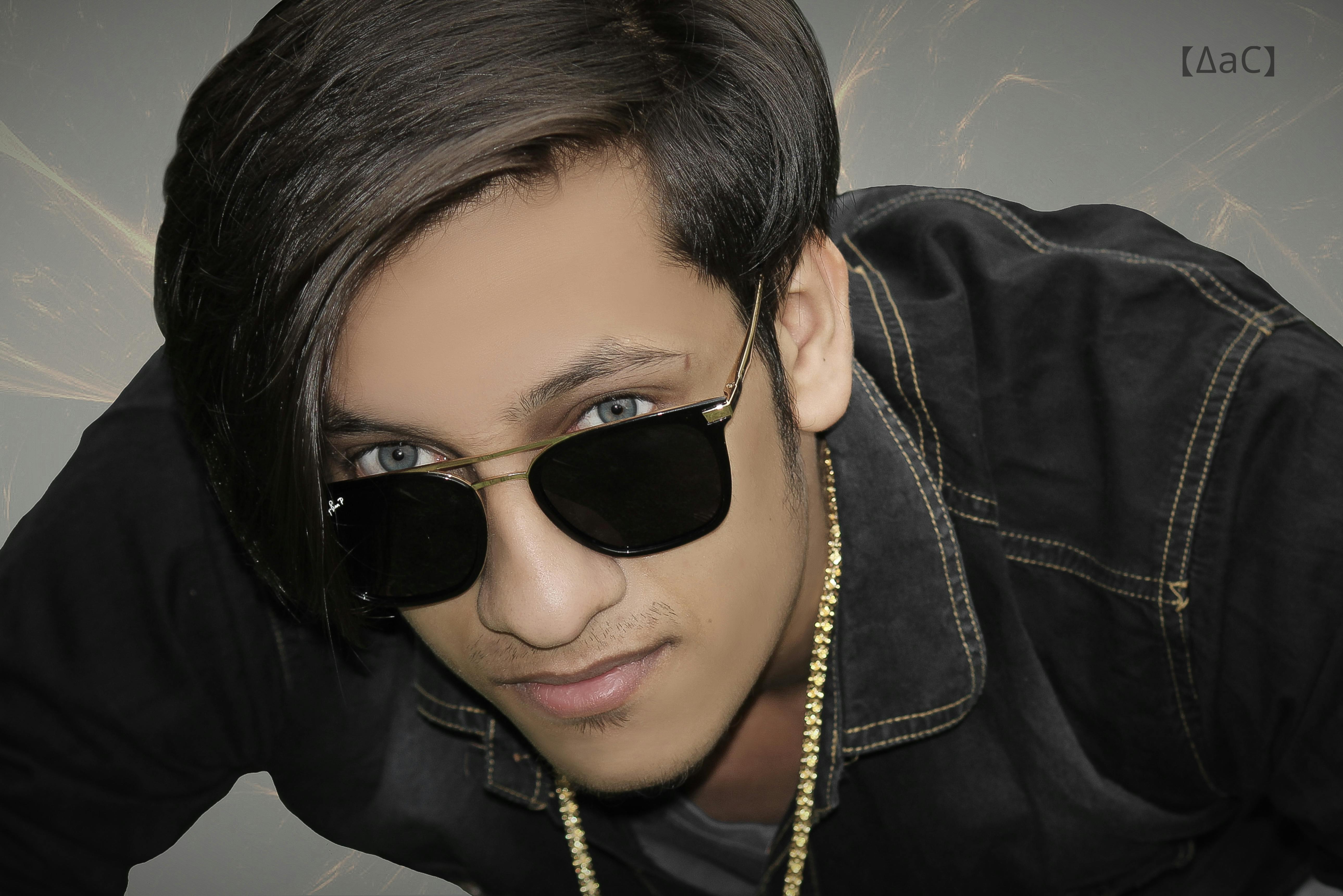 Mother holding her child’s hand in a clinic waiting room, both looking thoughtful