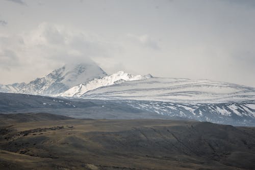 Gratis arkivbilde med fjell, høyland, snø