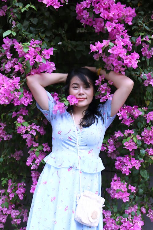 Woman among Purple Flowers