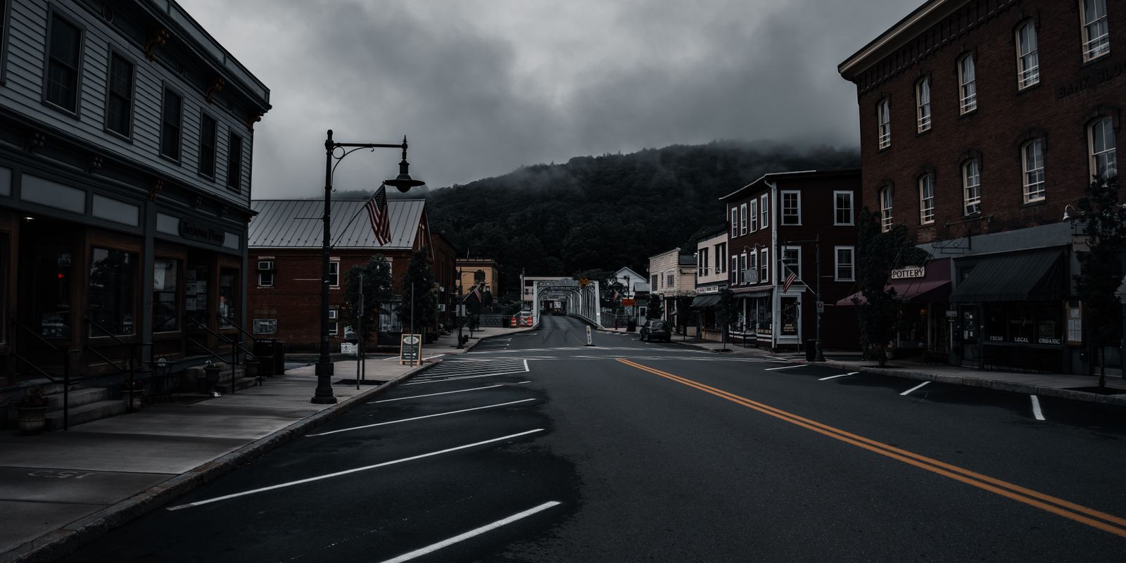 A quiet street lined with historic buildings in downtown Lewisburg