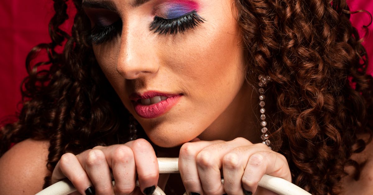 eye shadow model stock photos, images and backgrounds... Woman with Colored Eye Shadow Sits Backwards · Free Stock Photo