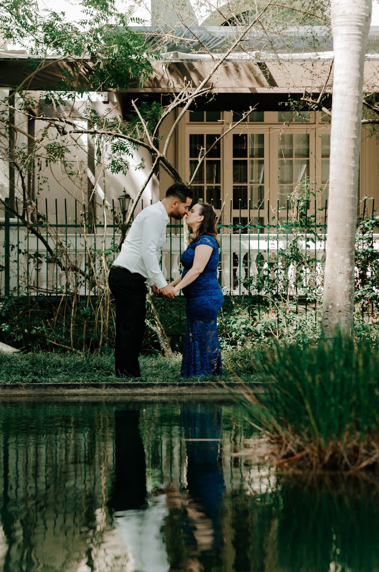 A Couple Kissing In The Garden