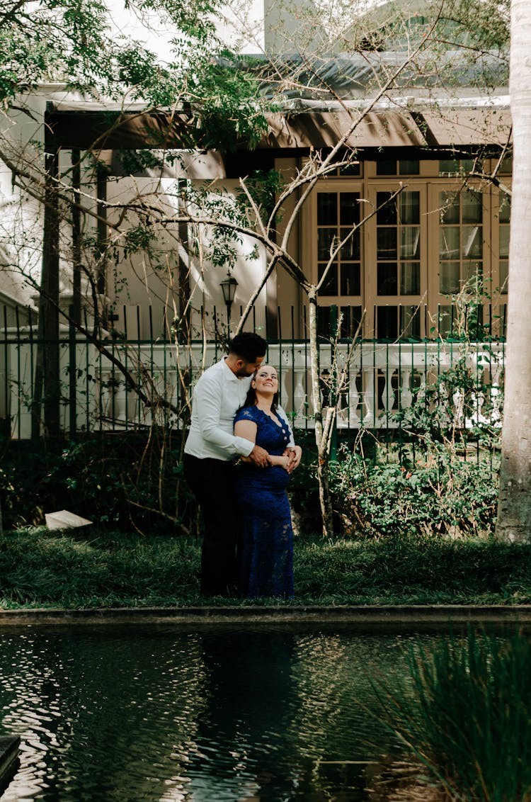 A Couple Posing In The Garden