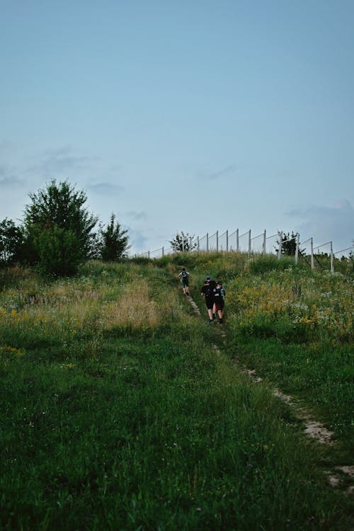 People on Footpath on Green Hill