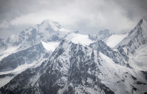 Free Breathtaking view of snow-covered peaks in the Austrian Alps, Hintertux. Stock Photo