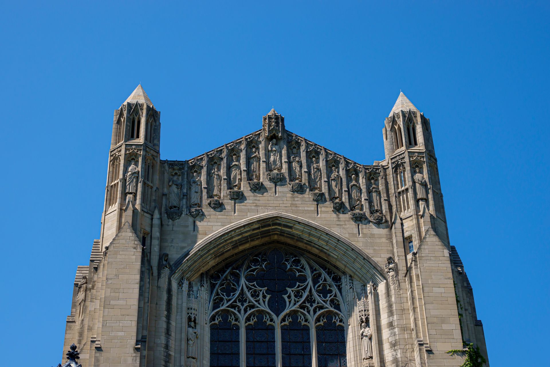Detailed view of the neo-gothic architecture and ornate facade of Rockefeller Memorial Chapel.