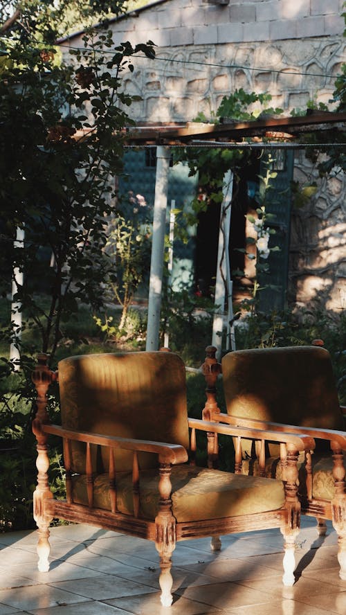 Vintage Armchairs Standing on a Patio
