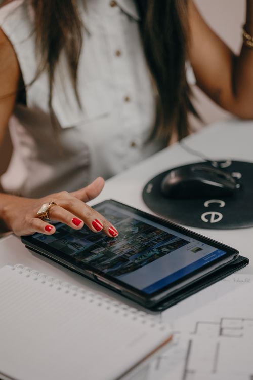Woman Hand on Tablet Screen · Free Stock Photo