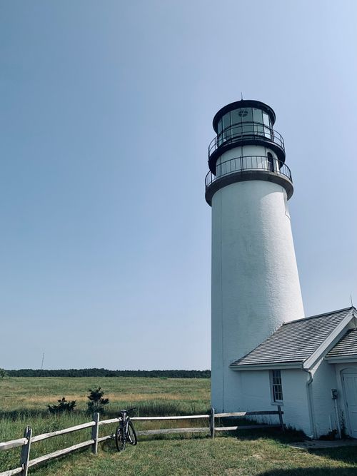 Free Highland Lighthouse in Cape Cod, MA, a historic landmark on a clear summer day. Stock Photo