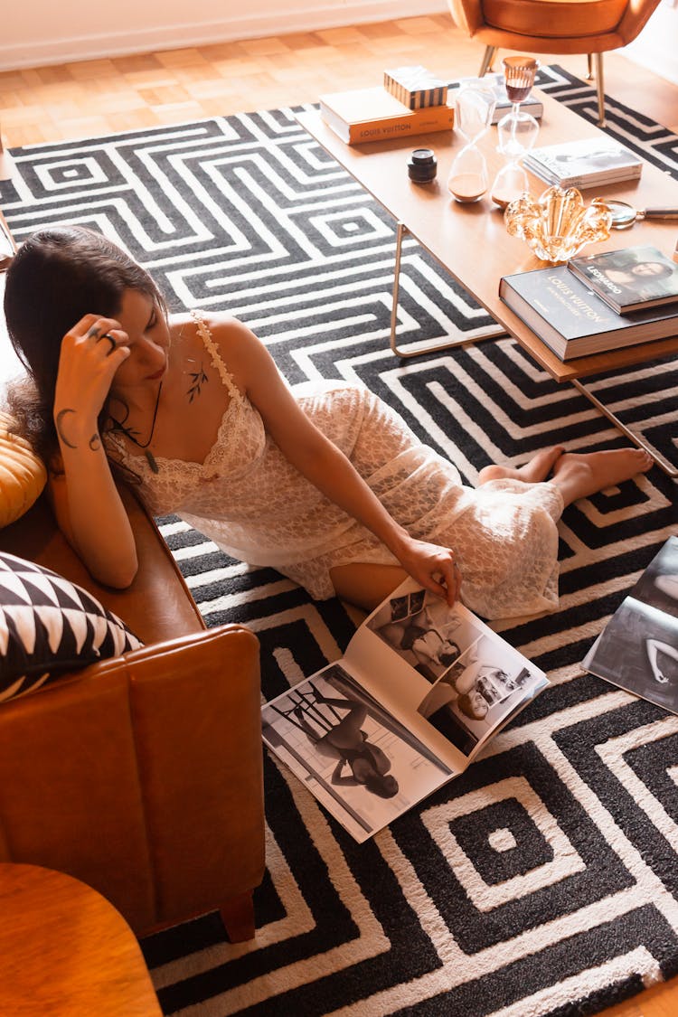 Woman Reading A Fashion Journal