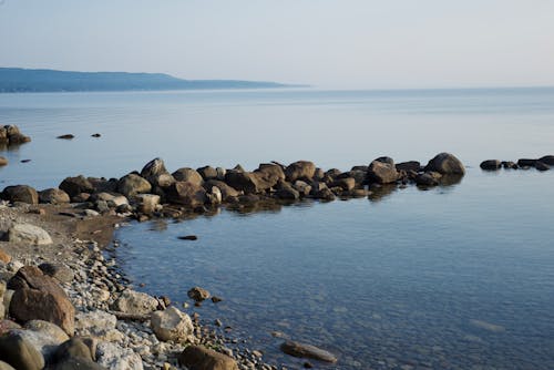 Бесплатное стоковое фото с берег, волнорез, море