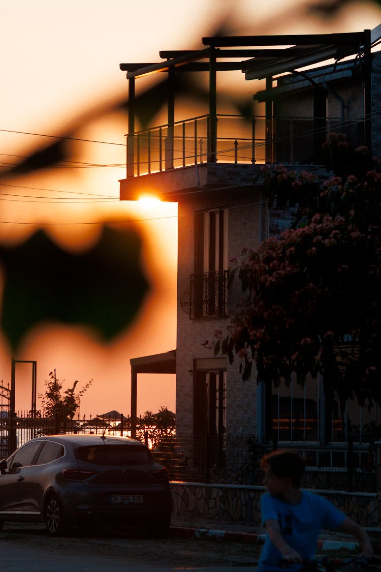 Balcony In A House Building During Sunset