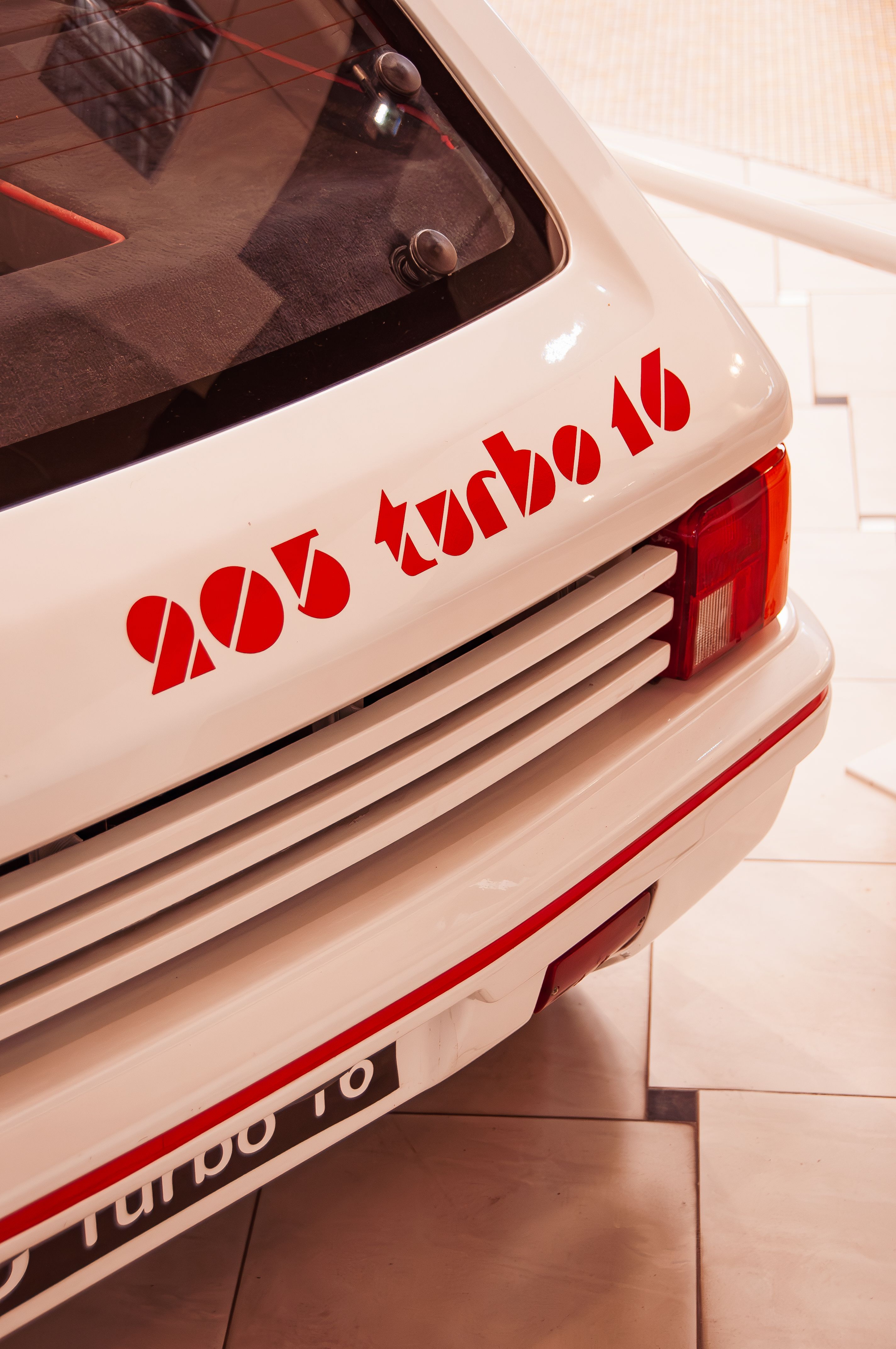 Close-up of the Sign on the Back of a Peugeot 205 Turbo 16 · Free Stock ...
