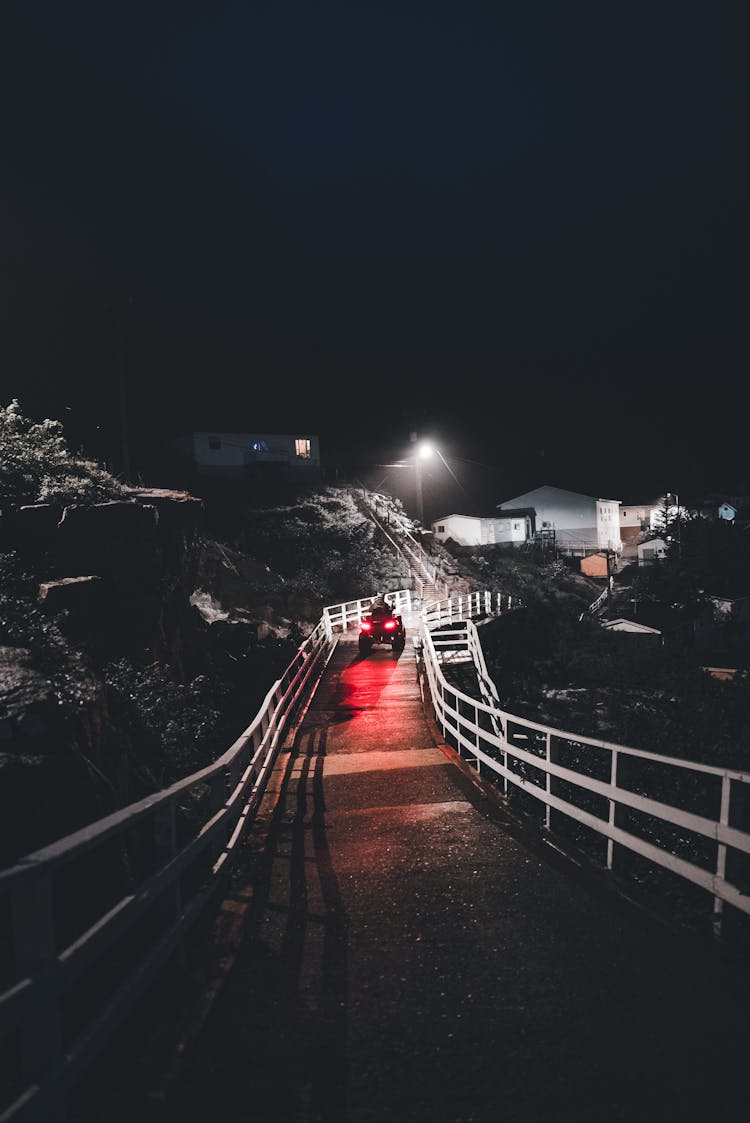 Quad Bike Running On Street At Night