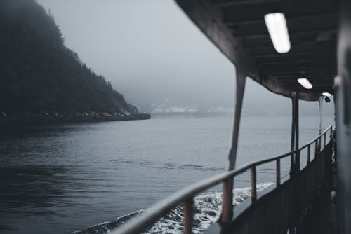 Free View from a Boat Sailing during a Foggy Weather Stock Photo