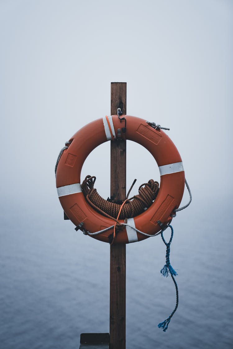 Fog Over Lifebuoy On Post