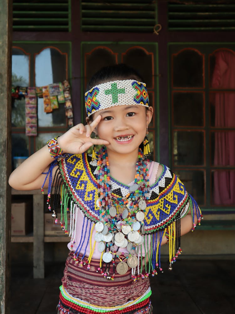 Smiling Boy In Traditional Clothing