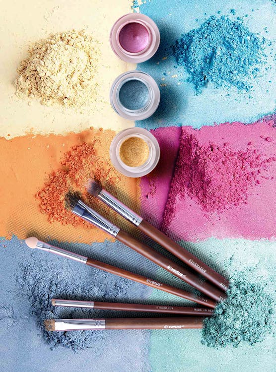 Free colored powders and brush stock photo