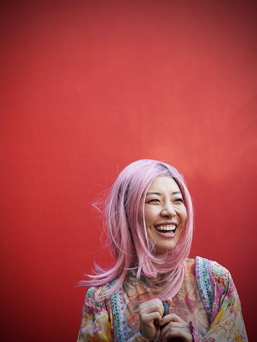 Free Smiling Woman with Pink Hair Stock Photo
