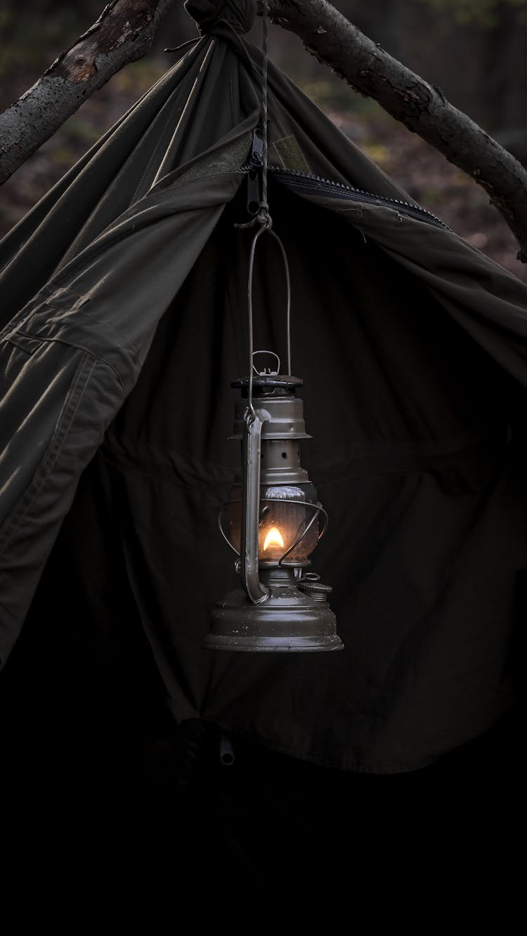 Vintage Lantern In Tent Entrance