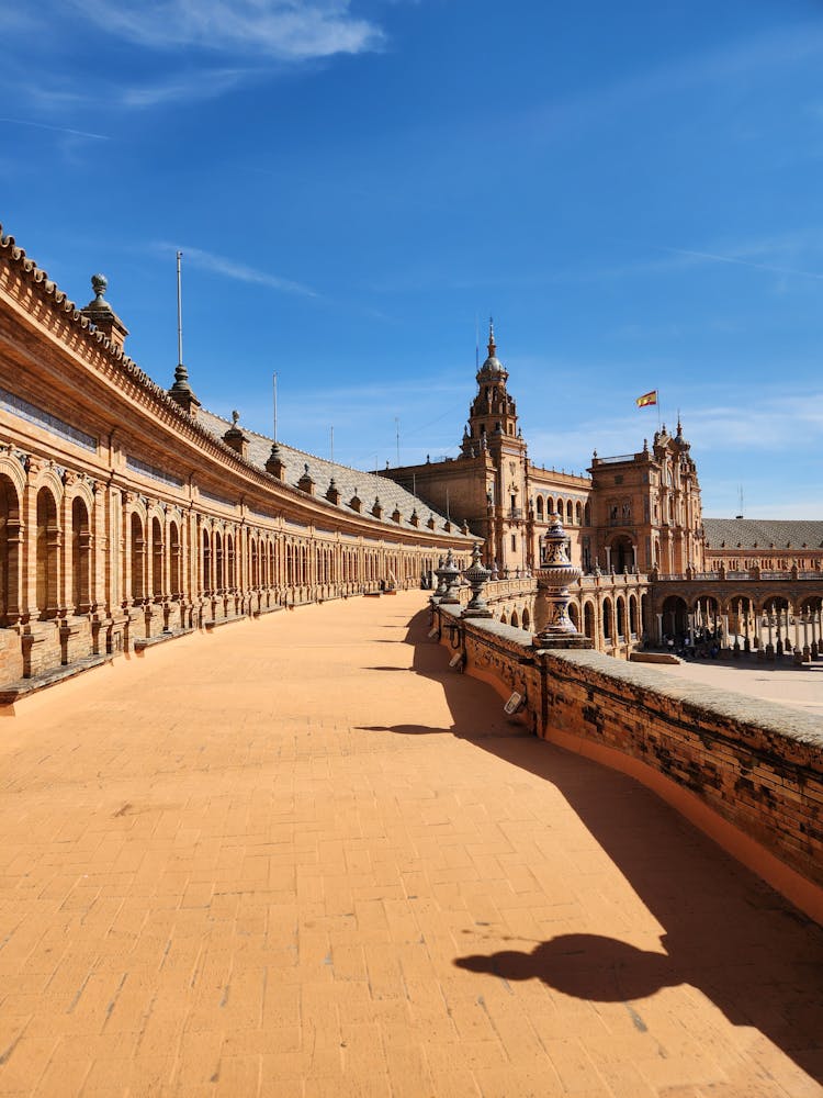 Sunlit Plaza De Espana In Seville