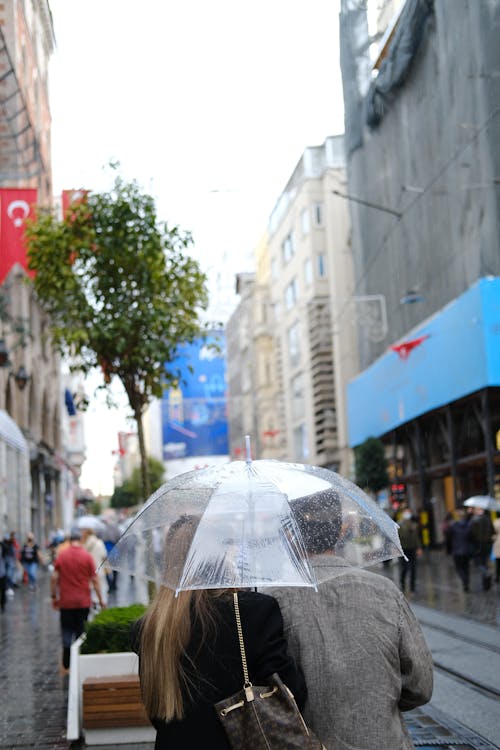 Couple with Umbrella in a City in Turkey