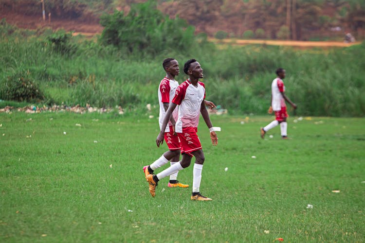 Football Players On Grass