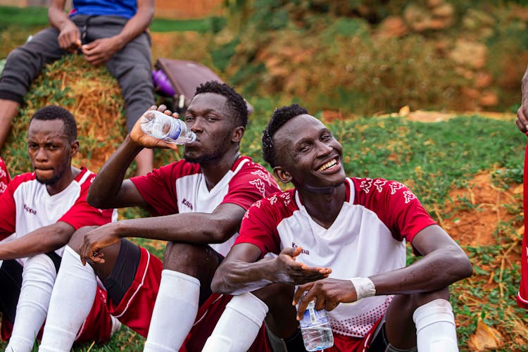 Football Players Sitting