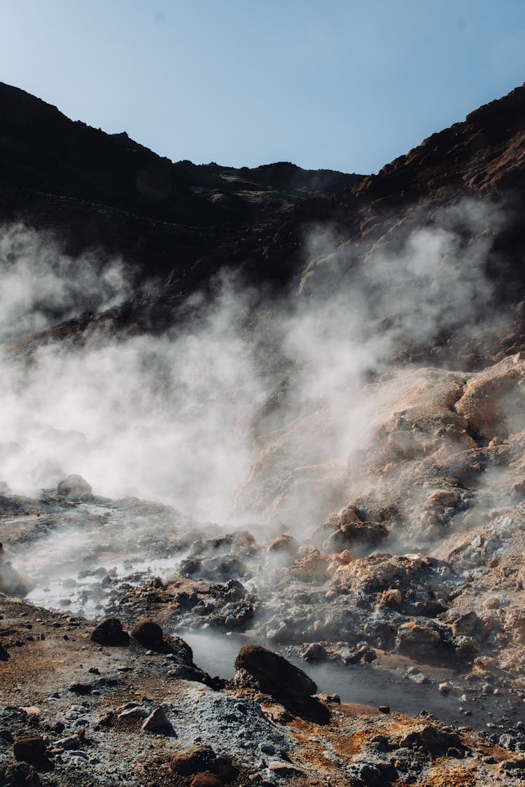 Steam Over Stream Among Hills