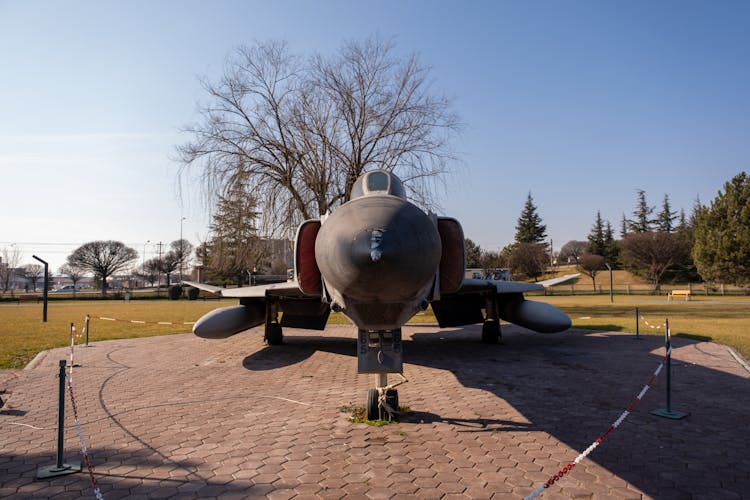 Military Airplane On A Square