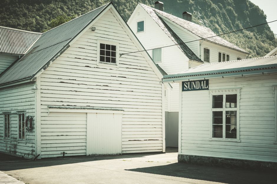 The exterior of a Vinmonopolet store in Norway, a state-run liquor outlet.
