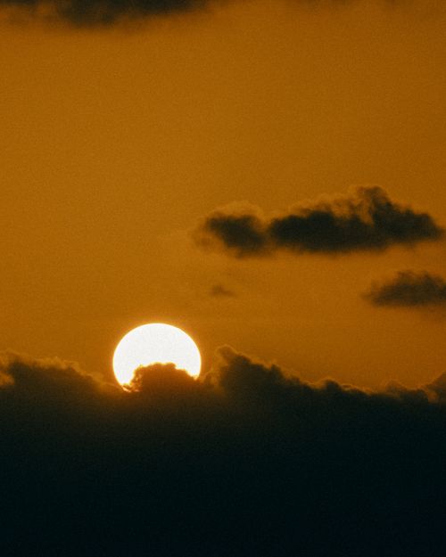 Free Serene sunset with dramatic clouds over Mellieħa, Malta. Stock Photo