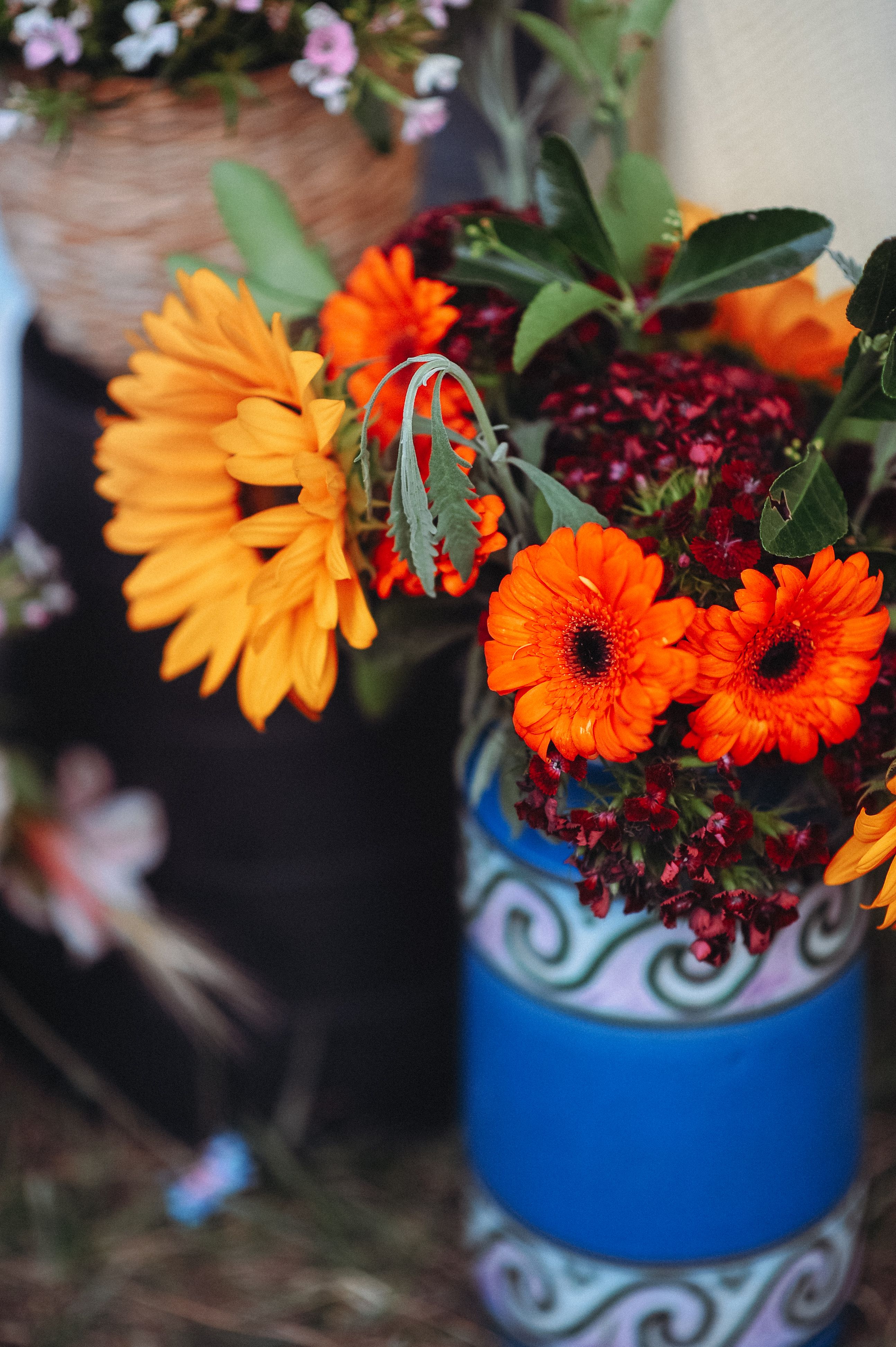 [ColoSach]-colorful-bouquet-of-orange-flowers-in-a-decorative-vase,-perfect-for-brightening-any-space.