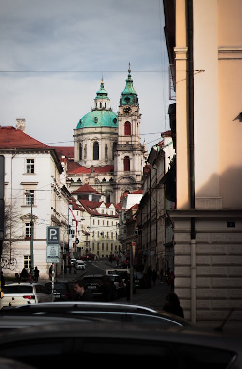 View of the St. Nicholas Church from a Street in Prague, Czech Republic