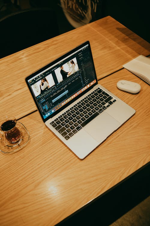 Laptop on a Table in a Coffee Shop