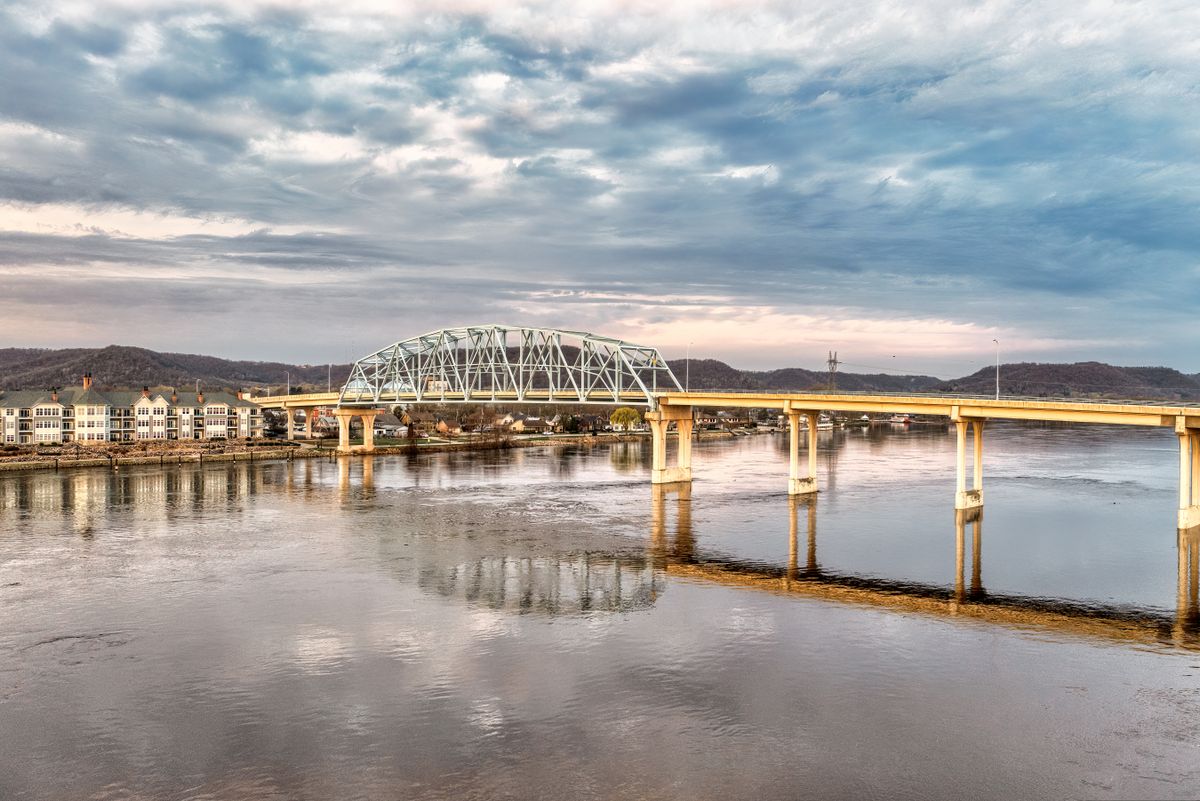 A steel truss bridge carrying old Route 66 traffic over the Mississippi River