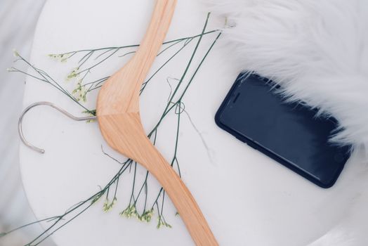 Black Iphone 7 Near Brown Clothes Hanger