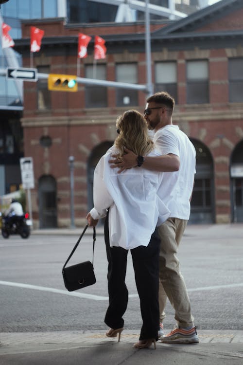 An Elegant Couple Walking in City 