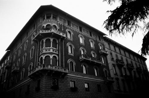 Black and White Photo of an Ornately Ornamented Building in Milan, Italy