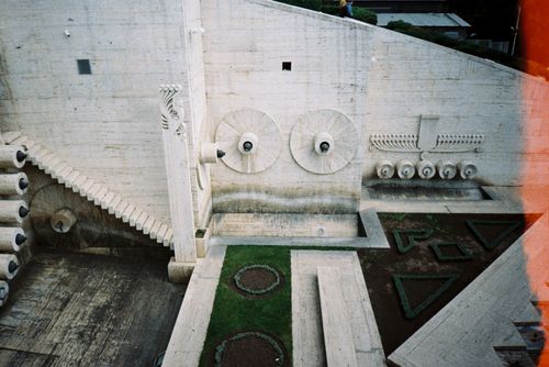 Free Concrete art installation with geometric shapes and steps in an urban environment. Stock Photo