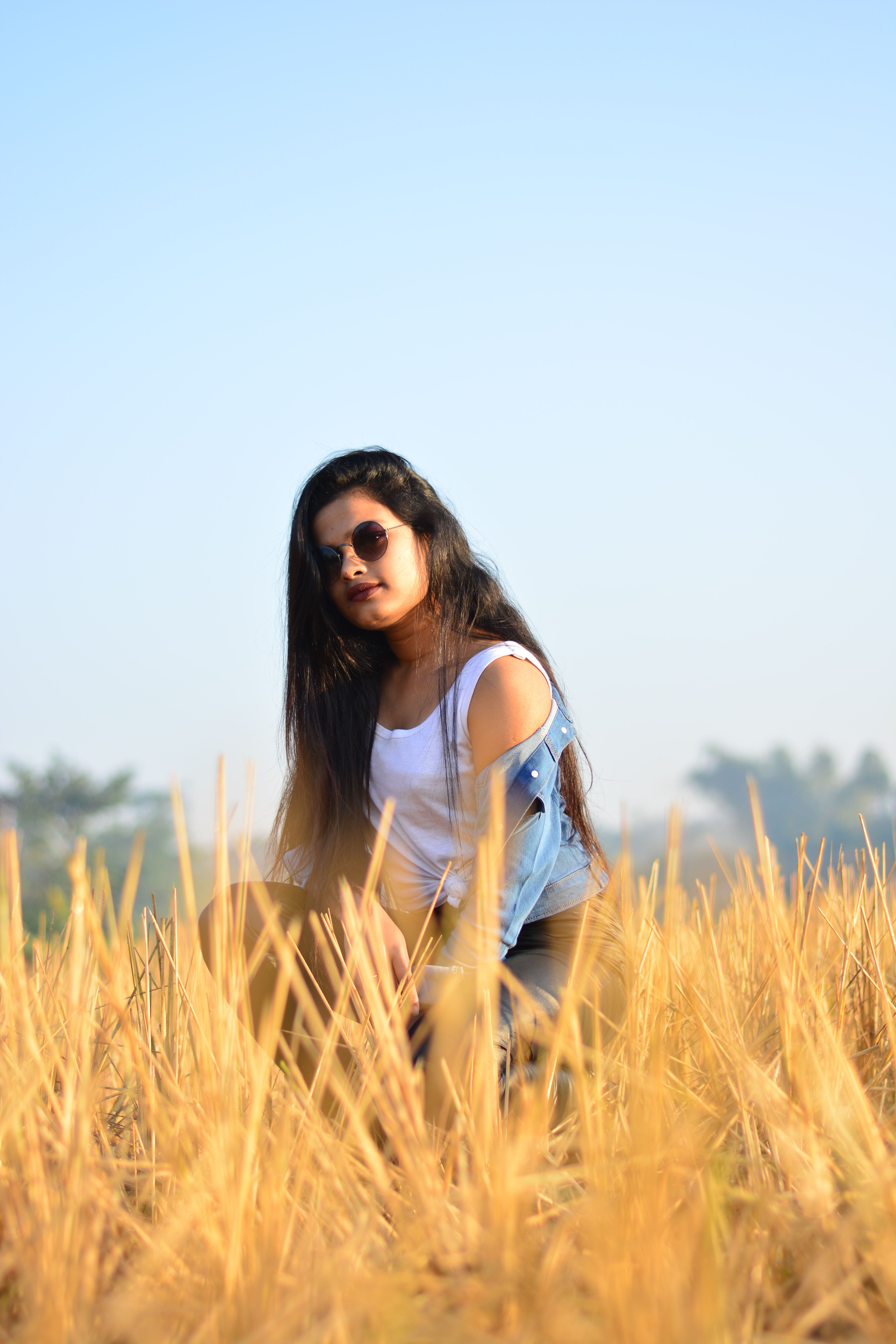 Woman in White Sleeveless Dress on Grass Field · Free Stock Photo