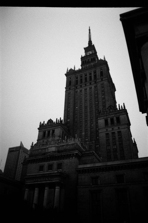 Free Low angle black and white photo of the Palace of Culture and Science in Warsaw, Poland. Stock Photo