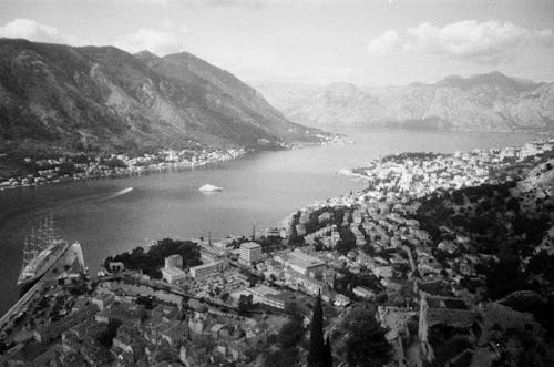 Town on Lakeshore with Hills behind