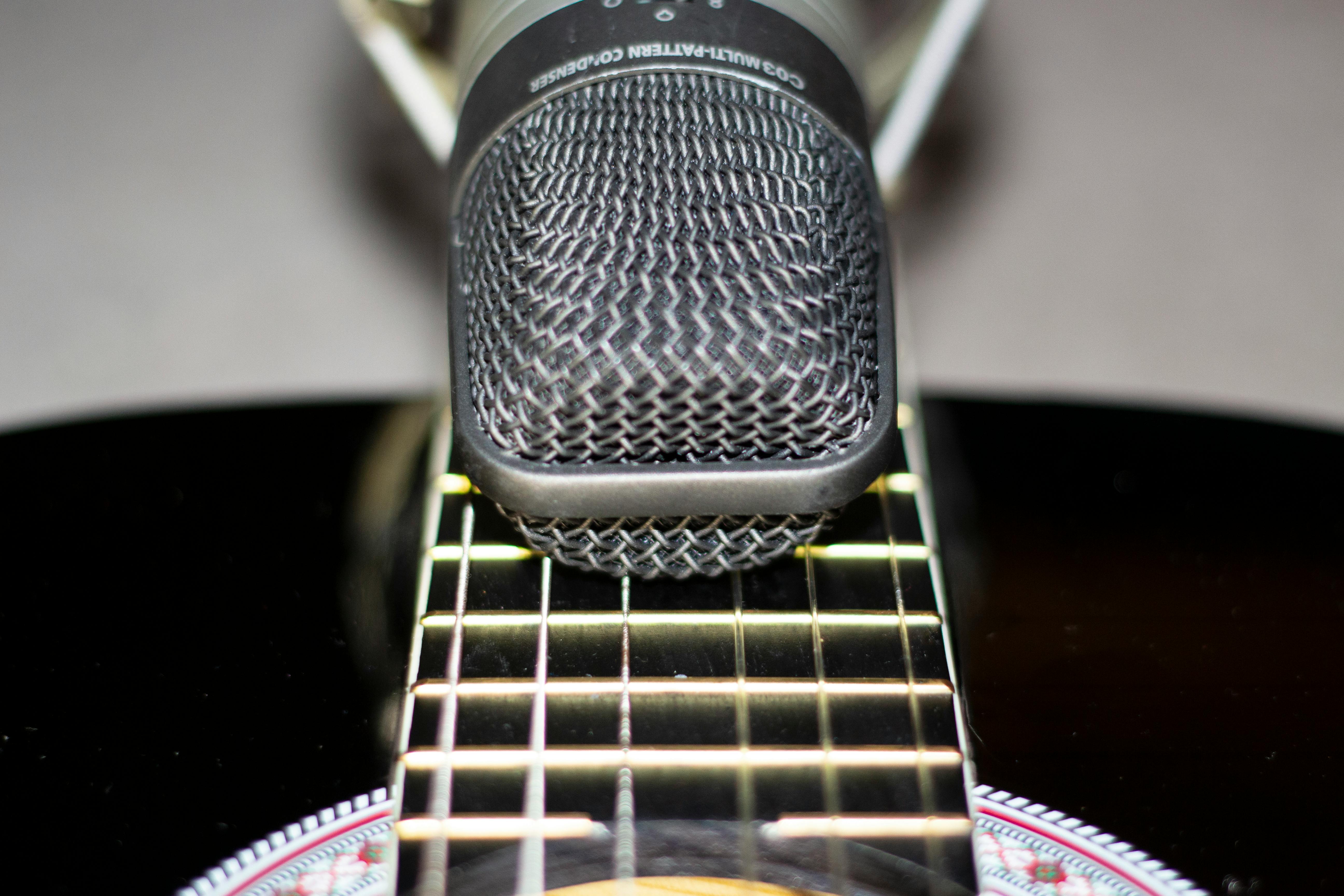 Free stock photo of mic on guitar, microphone