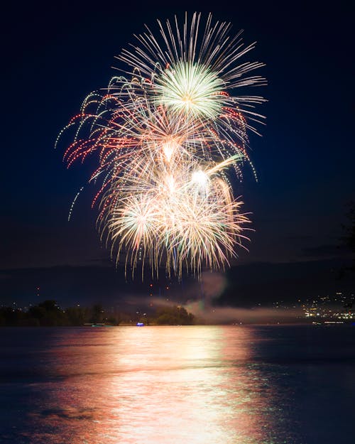 Fireworks over Water at Night