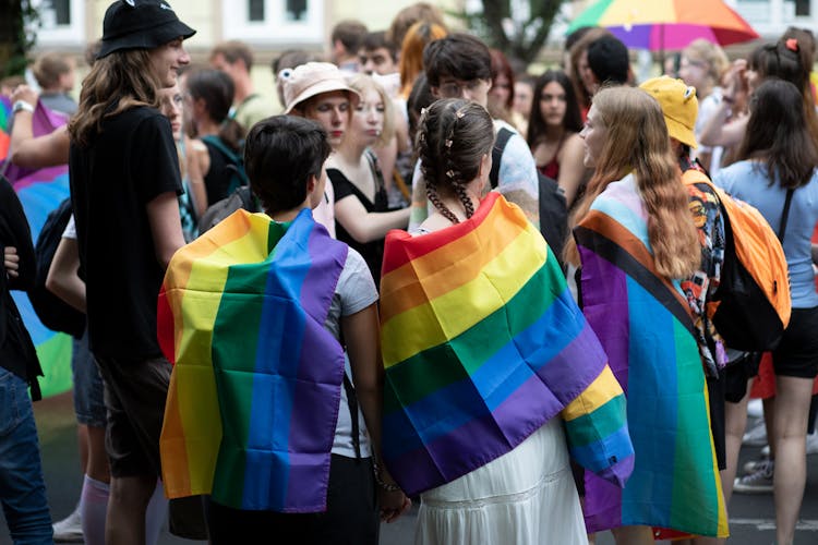 Group Of Young People With Rainbow Flags 