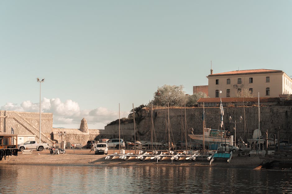 Boats Docked in front of a Citadel in Corsica